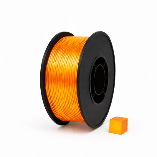 Skaidrus oranžinis PETG 3D plastikas 1.75 mm, 1 kg ritė – pagaminta Lietuvoje, Filacraft